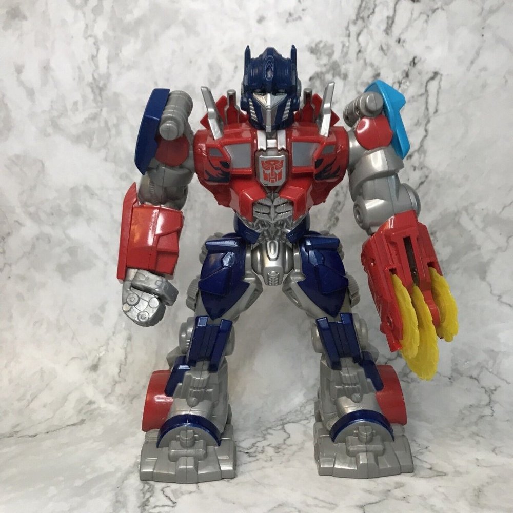 Hasbro Tomy Optimus Prime Light Up Talking Action Figure Saw Blade Transformer